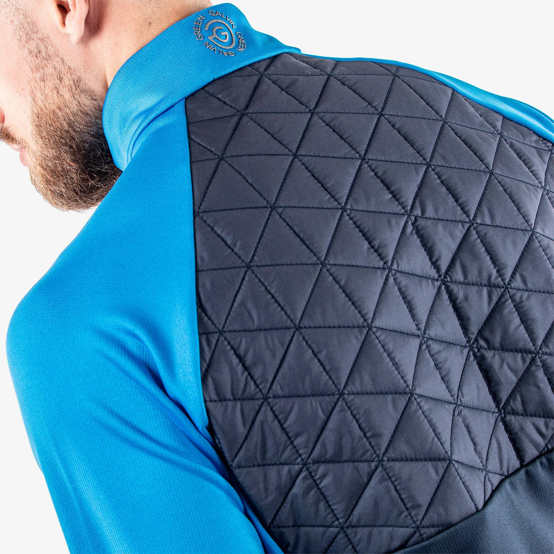 Dexter is a Insulating golf mid layer for Men in the color Navy/Blue(7)