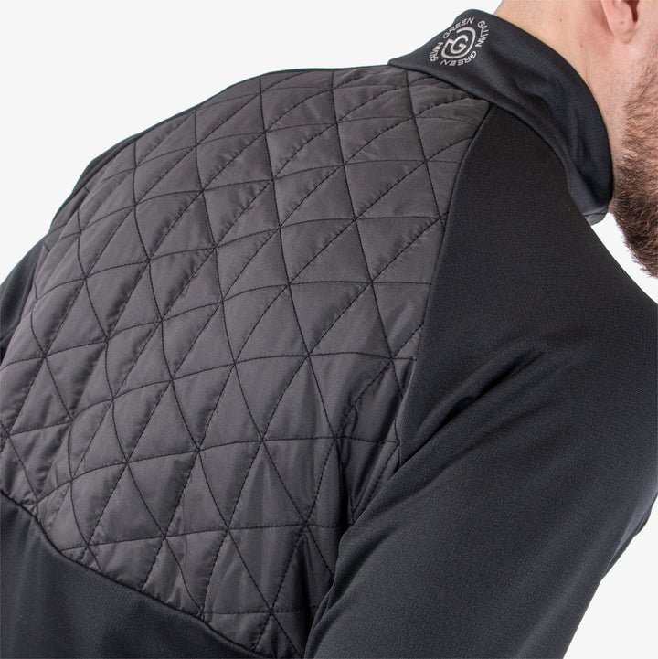 Dexter is a Insulating golf mid layer for Men in the color Black(7)