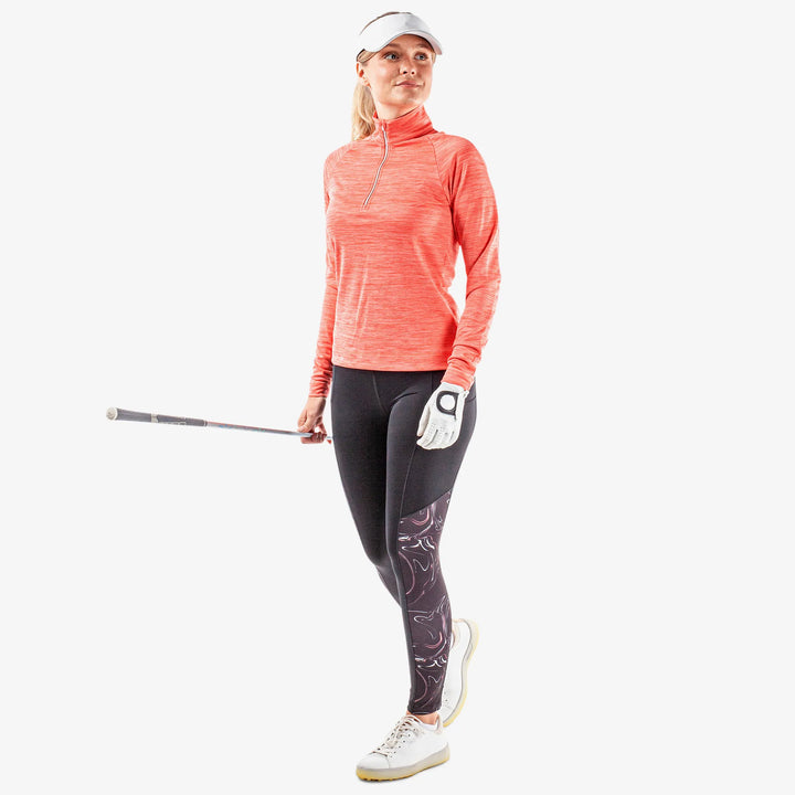 Dina is a Insulating golf mid layer for Women in the color Coral(2)