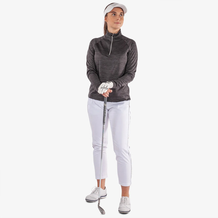 Dina is a Insulating golf mid layer for Women in the color Black(2)