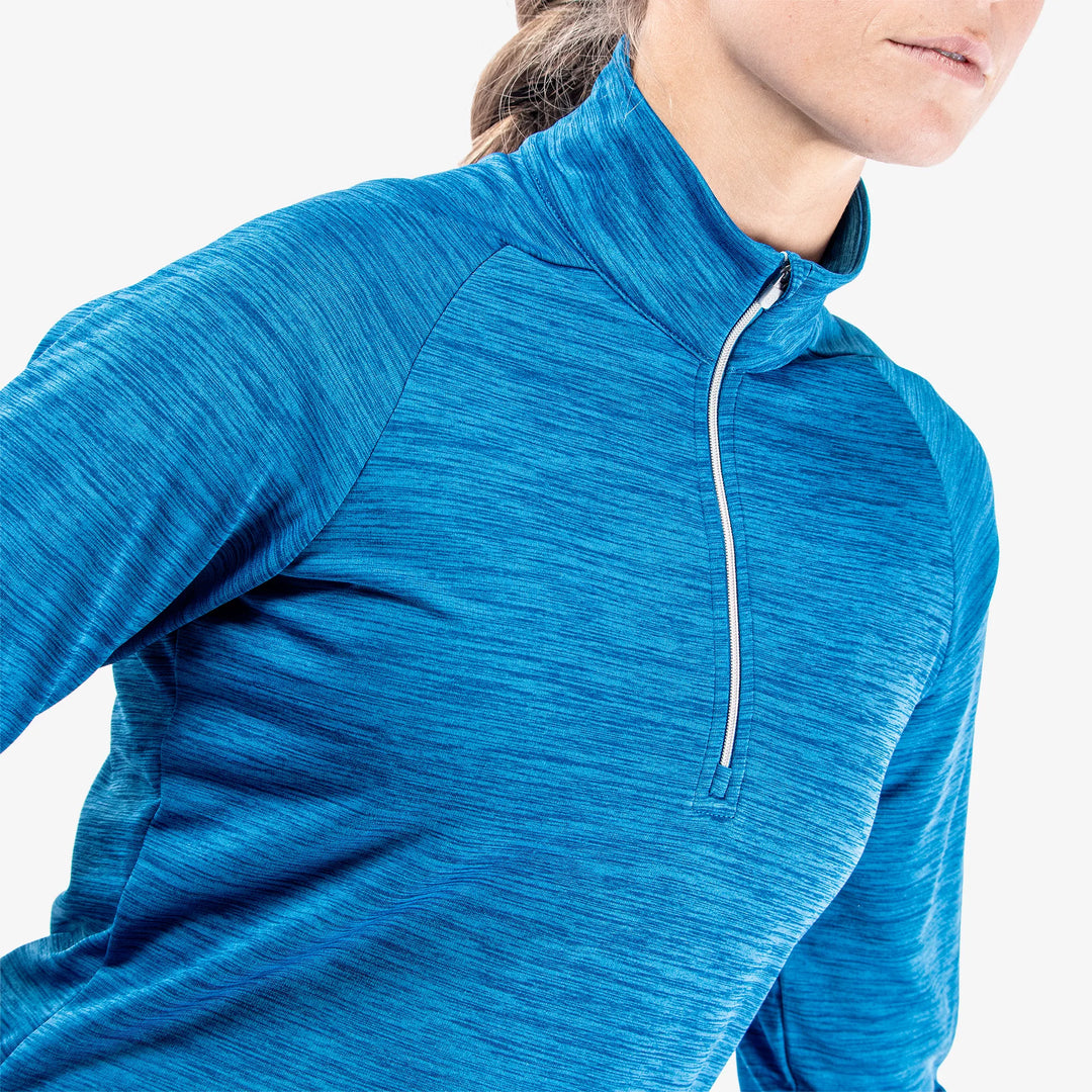Dina is a Insulating golf mid layer for Women in the color Blue(3)