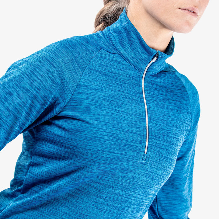 Dina is a Insulating golf mid layer for Women in the color Blue(3)