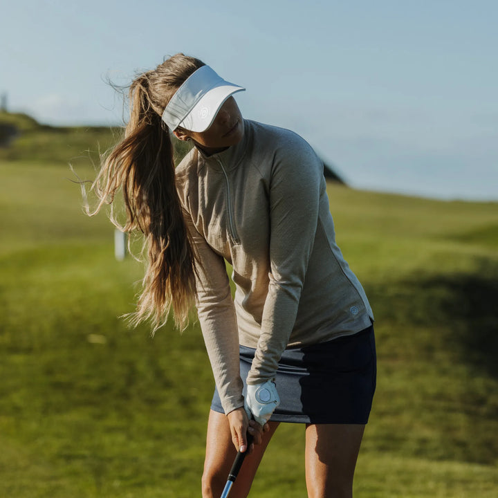 Diora is a Insulating golf mid layer for Women in the color Sand melange(7)