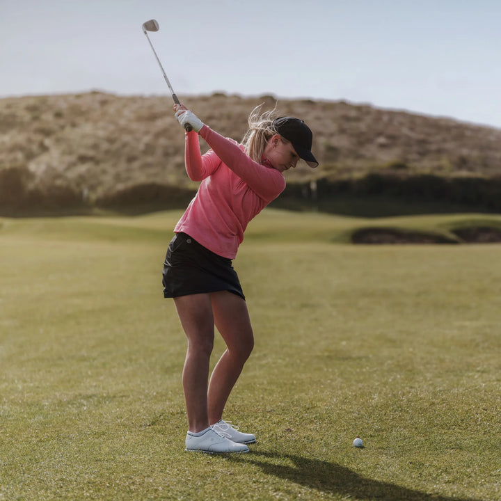 Diora is a Insulating golf mid layer for Women in the color Camelia Rose Melange(8)