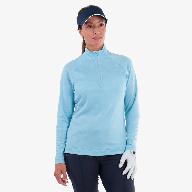 Diora is a Insulating golf mid layer for Women in the color Crystal Blue Melange(1)