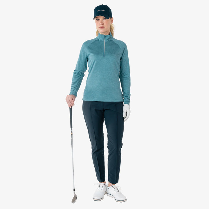 Diora is a Insulating golf mid layer for Women in the color Storm Blue Melange(2)