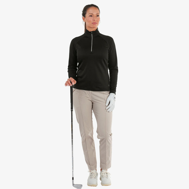 Diora is a Insulating golf mid layer for Women in the color Black(2)