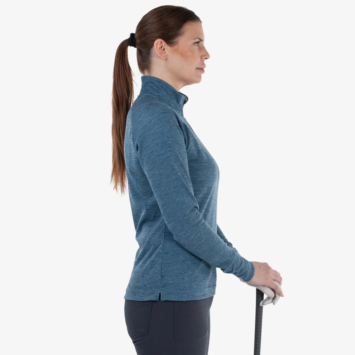 Diora is a Insulating golf mid layer for Women in the color Blue Melange (3)
