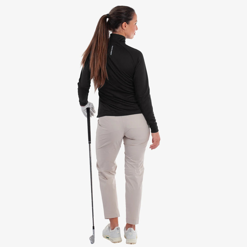 Diora is a Insulating golf mid layer for Women in the color Black(5)