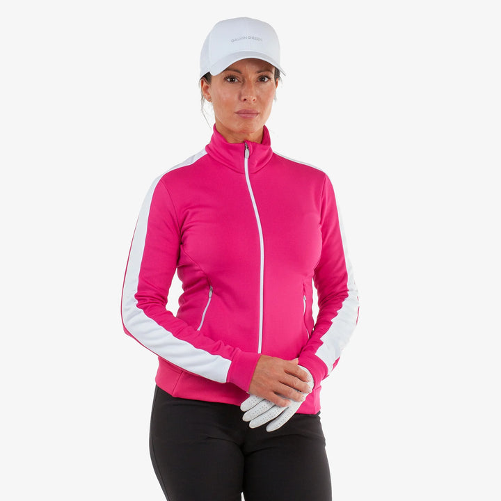 Dixie is a Insulating golf mid layer for Women in the color Fuchsia/White(1)