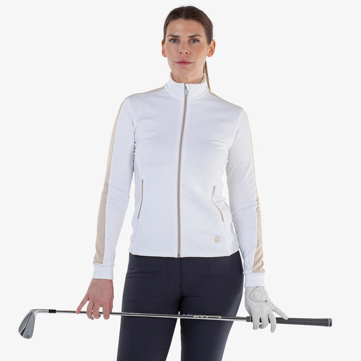 Dixie is a Insulating golf mid layer for Women in the color White/Sand(1)