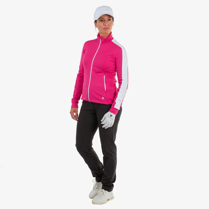 Dixie is a Insulating golf mid layer for Women in the color Fuchsia/White(2)