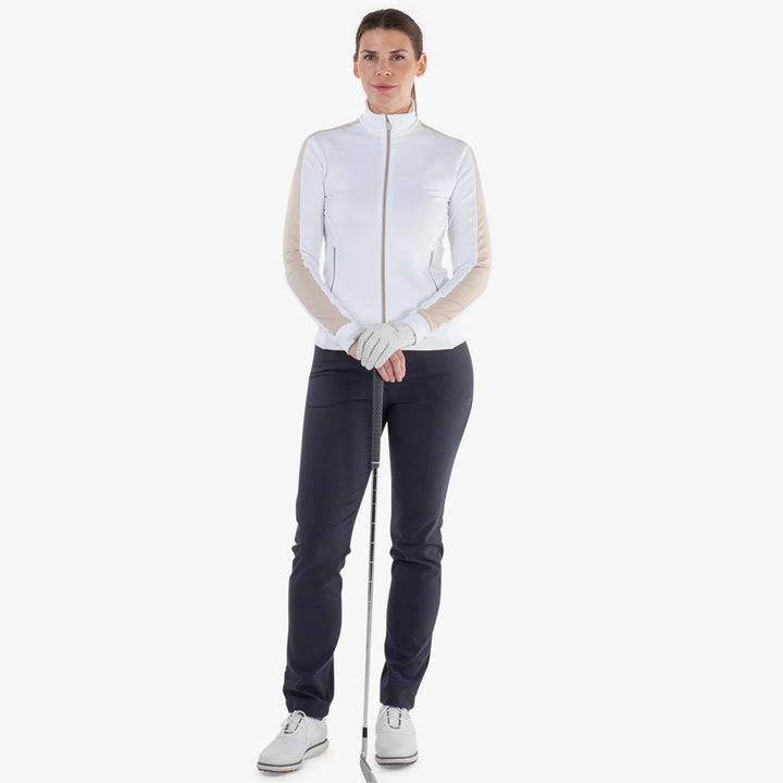 Dixie is a Insulating golf mid layer for Women in the color White/Sand(2)
