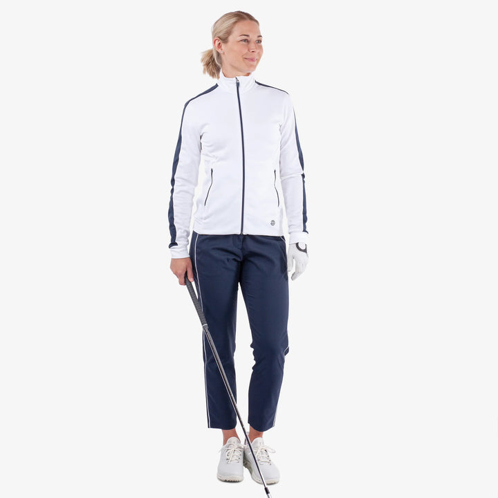 Dixie is a Insulating golf mid layer for Women in the color White/Navy(2)