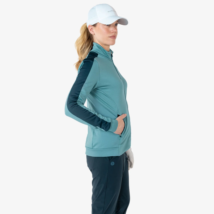 Dixie is a Insulating golf mid layer for Women in the color Storm Blue/Navy(3)