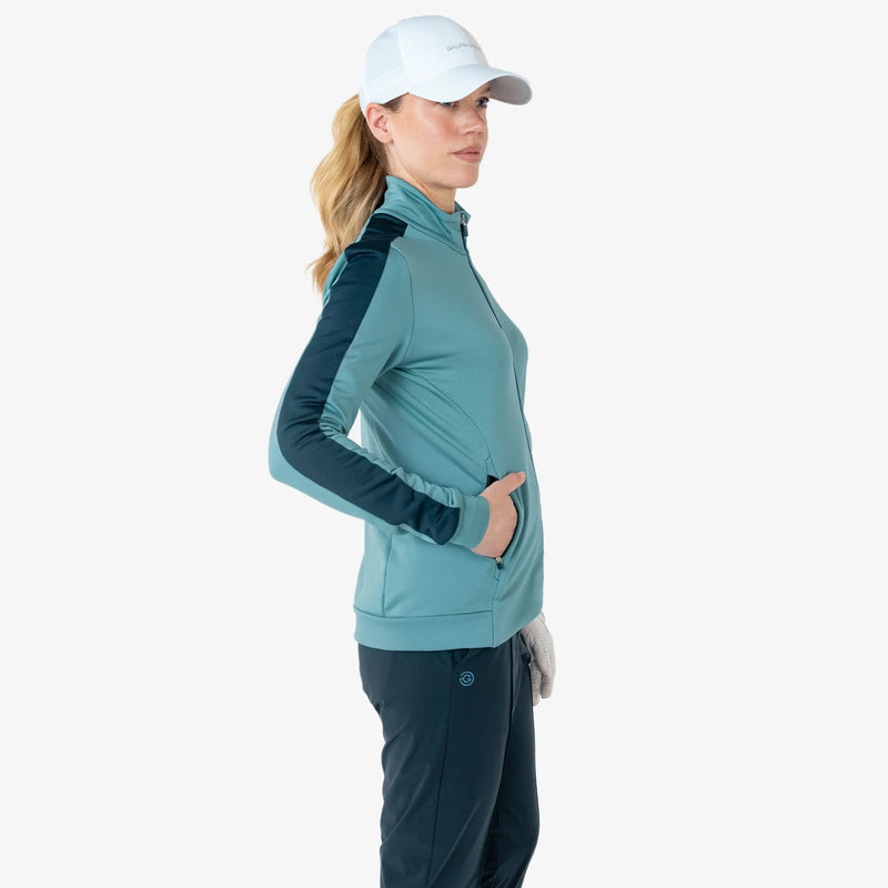 Dixie is a Insulating golf mid layer for Women in the color Storm Blue/Navy(3)