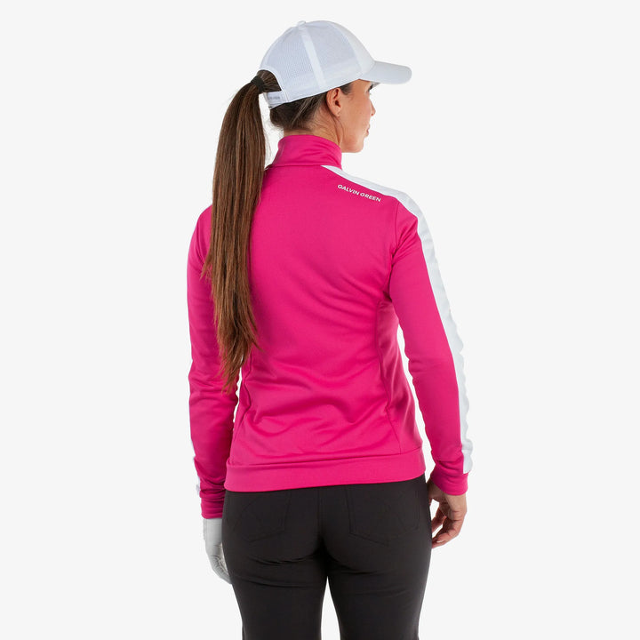 Dixie is a Insulating golf mid layer for Women in the color Fuchsia/White(4)