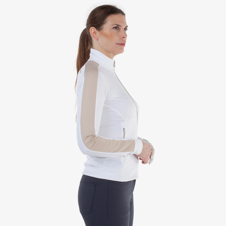 Dixie is a Insulating golf mid layer for Women in the color White/Sand(3)