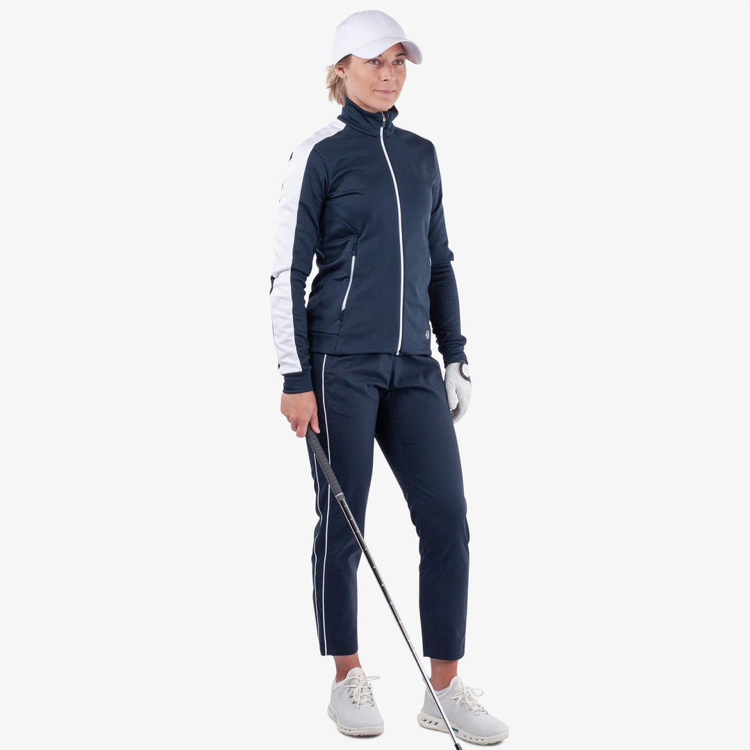 Dixie is a Insulating golf mid layer for Women in the color Navy/White(2)