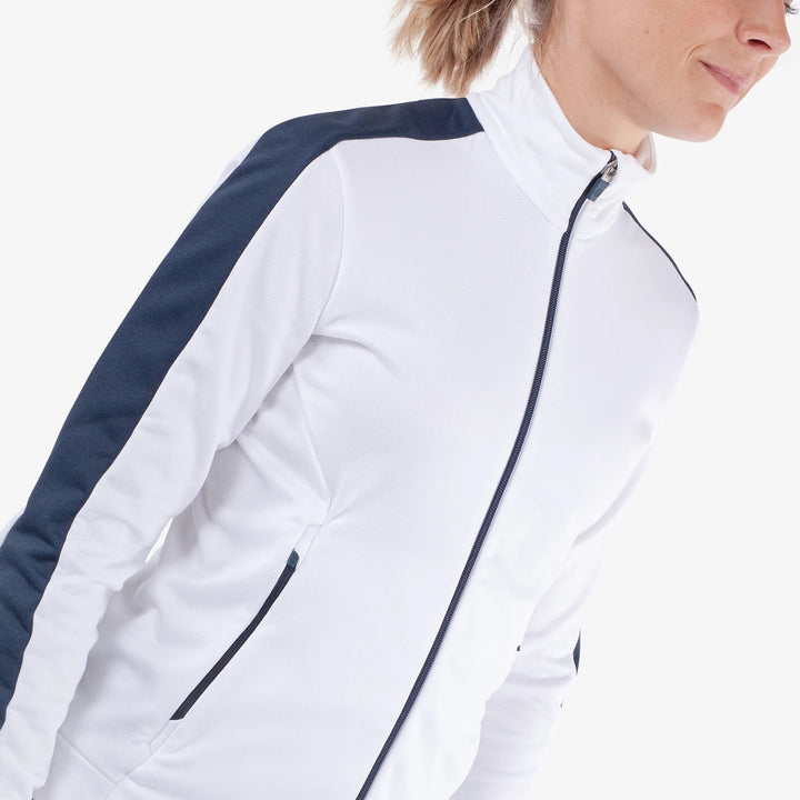 Dixie is a Insulating golf mid layer for Women in the color White/Navy(3)
