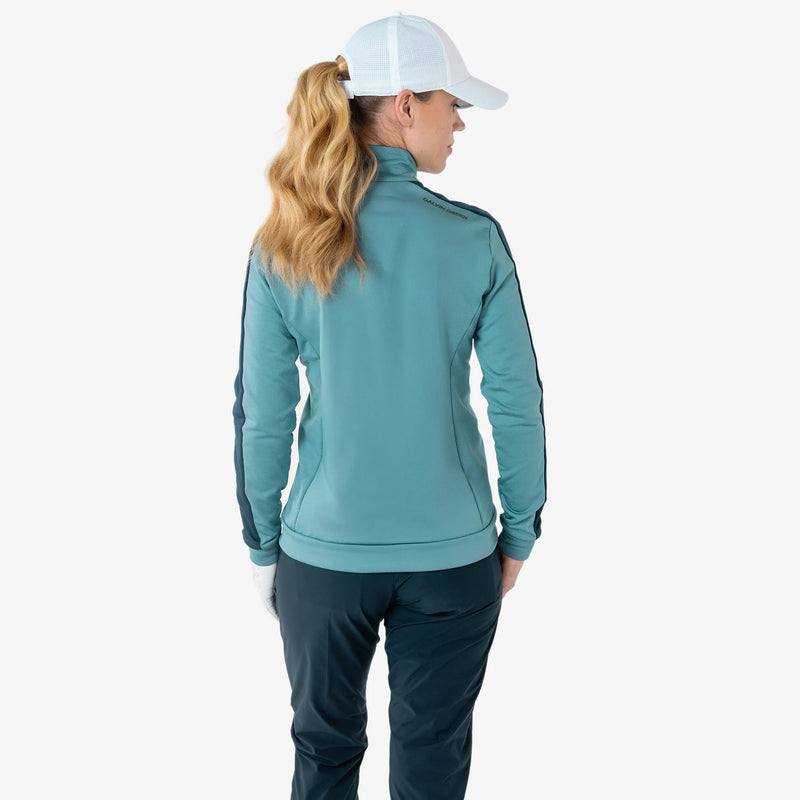 Dixie is a Insulating golf mid layer for Women in the color Storm Blue/Navy(4)