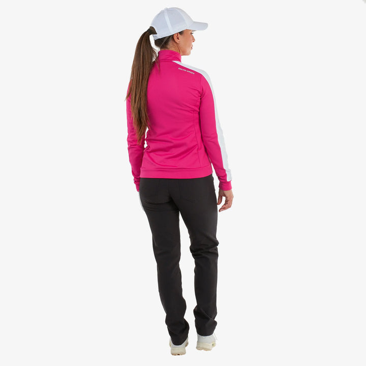 Dixie is a Insulating golf mid layer for Women in the color Fuchsia/White(5)