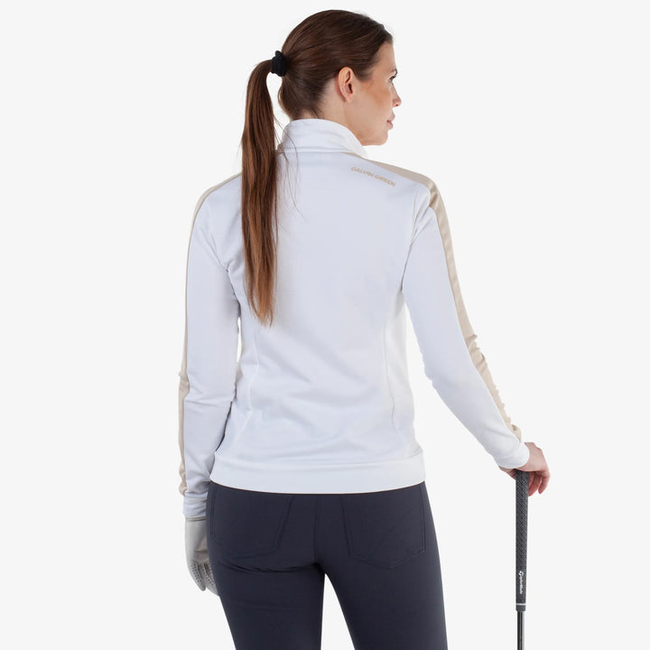 Dixie is a Insulating golf mid layer for Women in the color White/Sand(4)