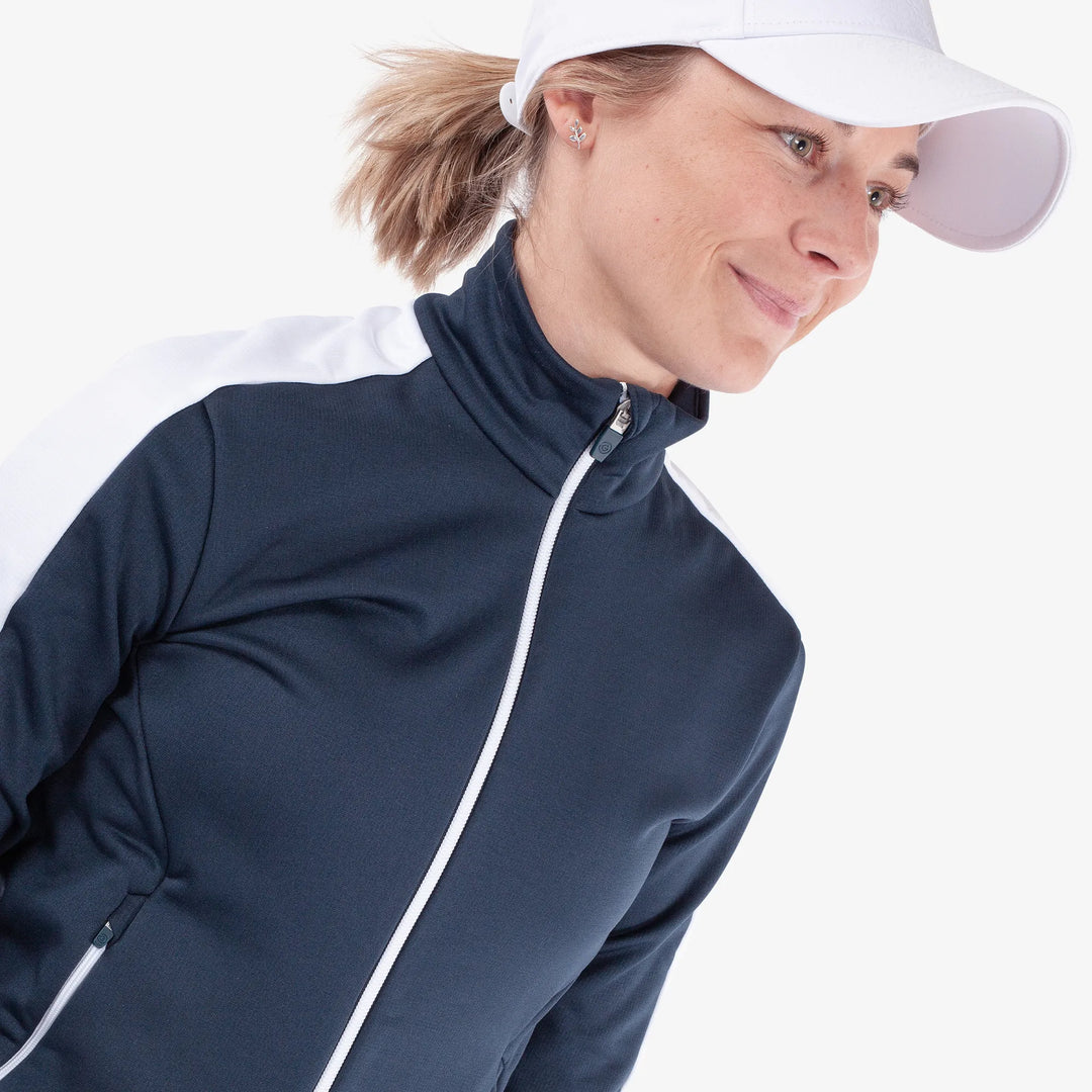 Dixie is a Insulating golf mid layer for Women in the color Navy/White(3)