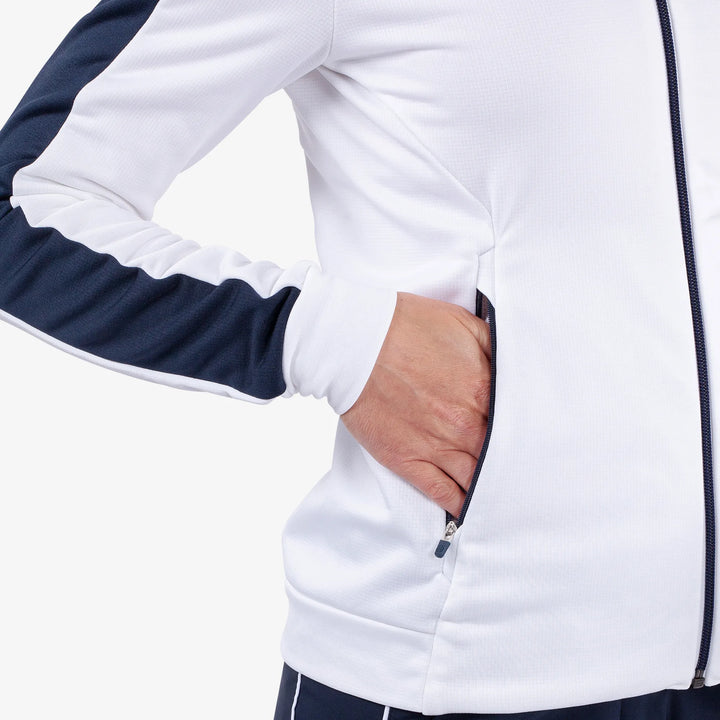 Dixie is a Insulating golf mid layer for Women in the color White/Navy(4)