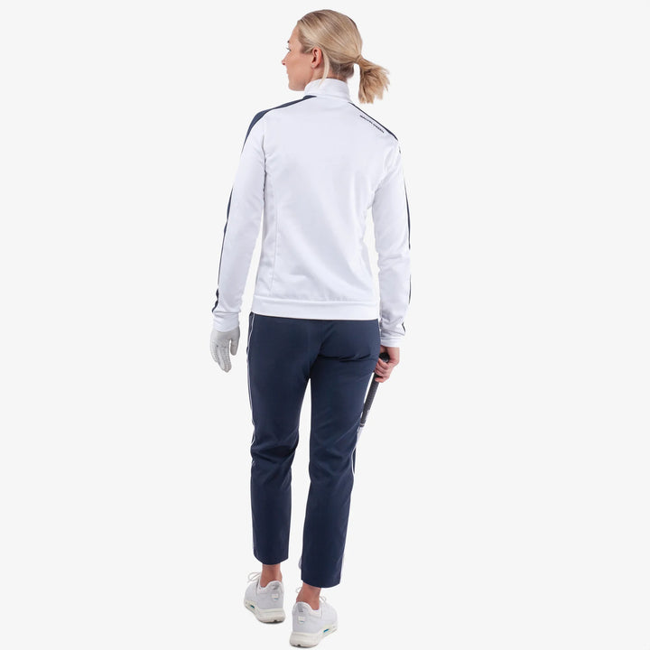 Dixie is a Insulating golf mid layer for Women in the color White/Navy(7)