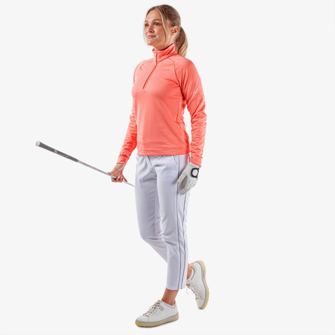 Dolly is a Insulating golf mid layer for Women in the color Coral(2)