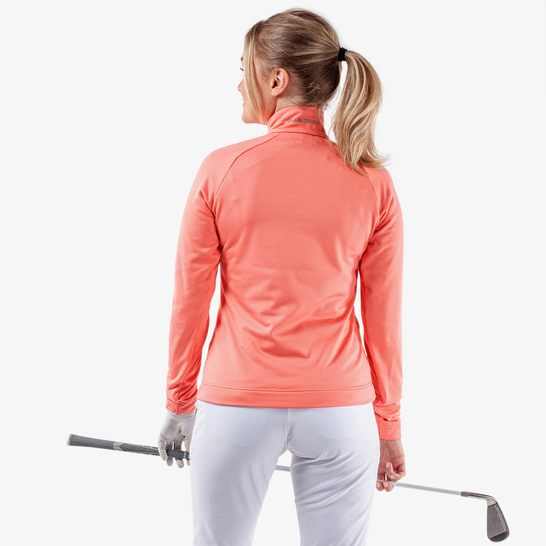 Dolly is a Insulating golf mid layer for Women in the color Coral(4)