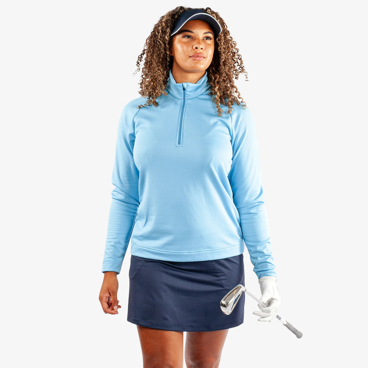 Dolly is a Insulating golf mid layer for Women in the color Alaskan Blue(1)