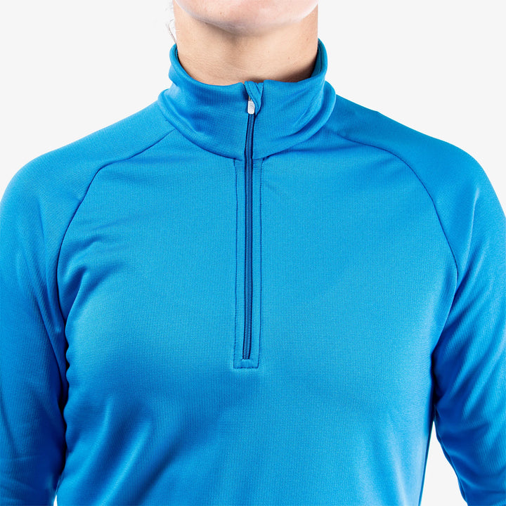 Dolly is a Insulating golf mid layer for Women in the color Blue(4)