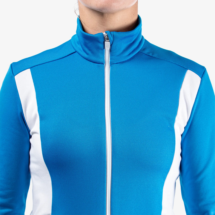 Donella is a Insulating golf mid layer for Women in the color Blue/White/Cool Grey(4)