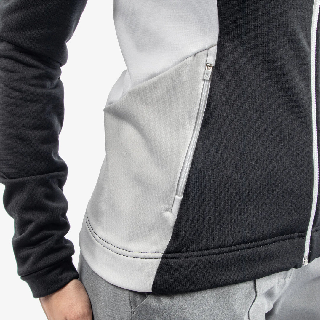 Donella is a Insulating golf mid layer for Women in the color Black/White/Cool Grey(6)