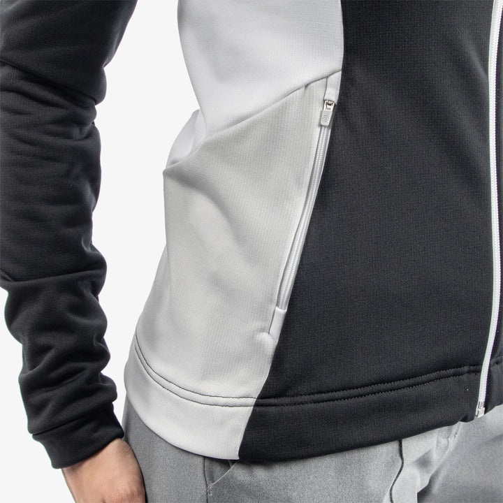 Donella is a Insulating golf mid layer for Women in the color Black/White/Cool Grey(6)
