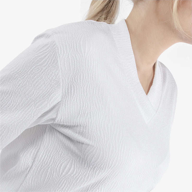 Donya is a Insulating golf mid layer for Women in the color White(3)