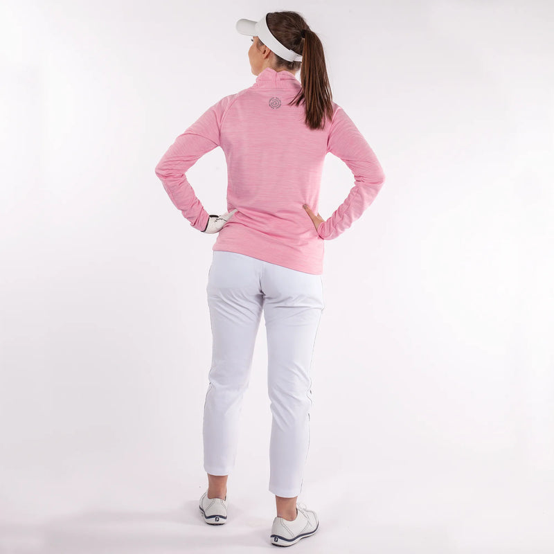 Dorali is a Insulating golf mid layer for Women in the color Imaginary Pink(6)