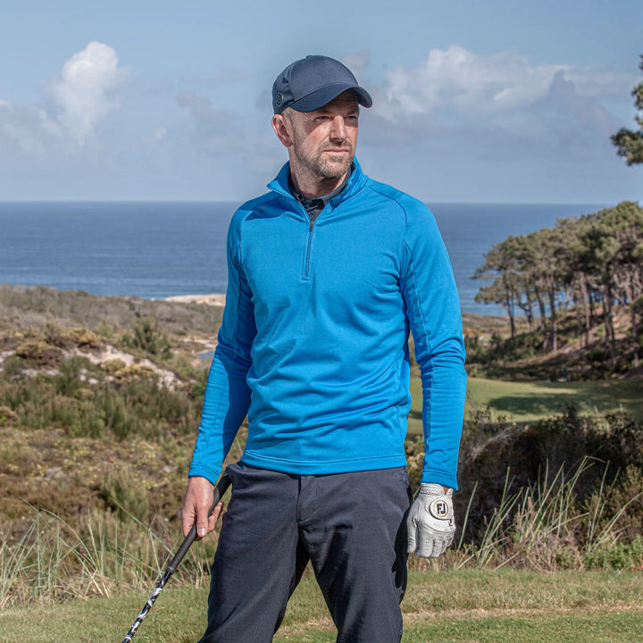 Drake is a Insulating golf mid layer for Men in the color Blue(9)