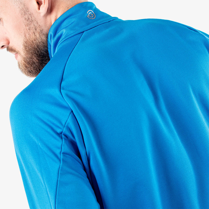 Drake is a Insulating golf mid layer for Men in the color Blue(6)