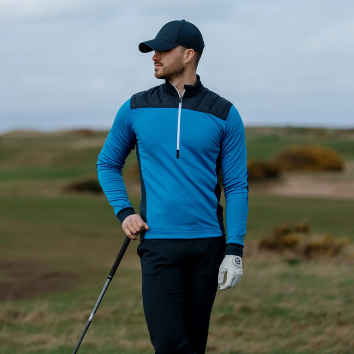 Durante is a Insulating golf mid layer for Men in the color Blue/Navy/White(10)