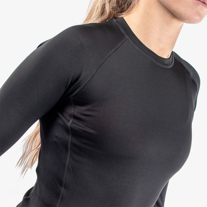 Elaine is a Thermal base layer golf top for Women in the color Black/Red(3)