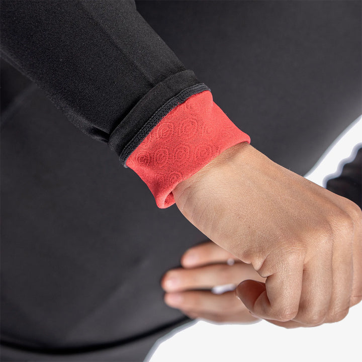 Elaine is a Thermal base layer golf top for Women in the color Black/Red(4)