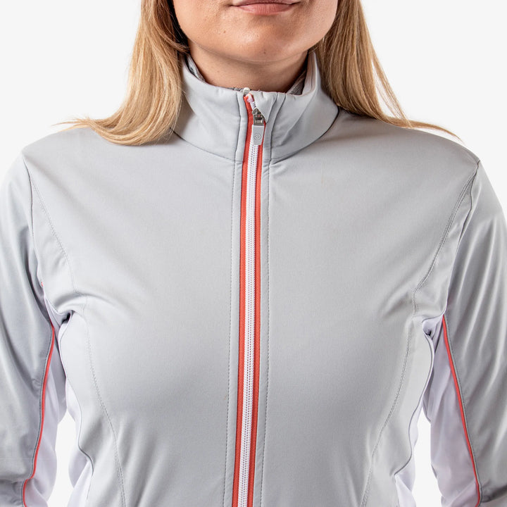 Larissa is a Windproof and water repellent golf jacket for Women in the color Cool Grey/White/Coral(3)