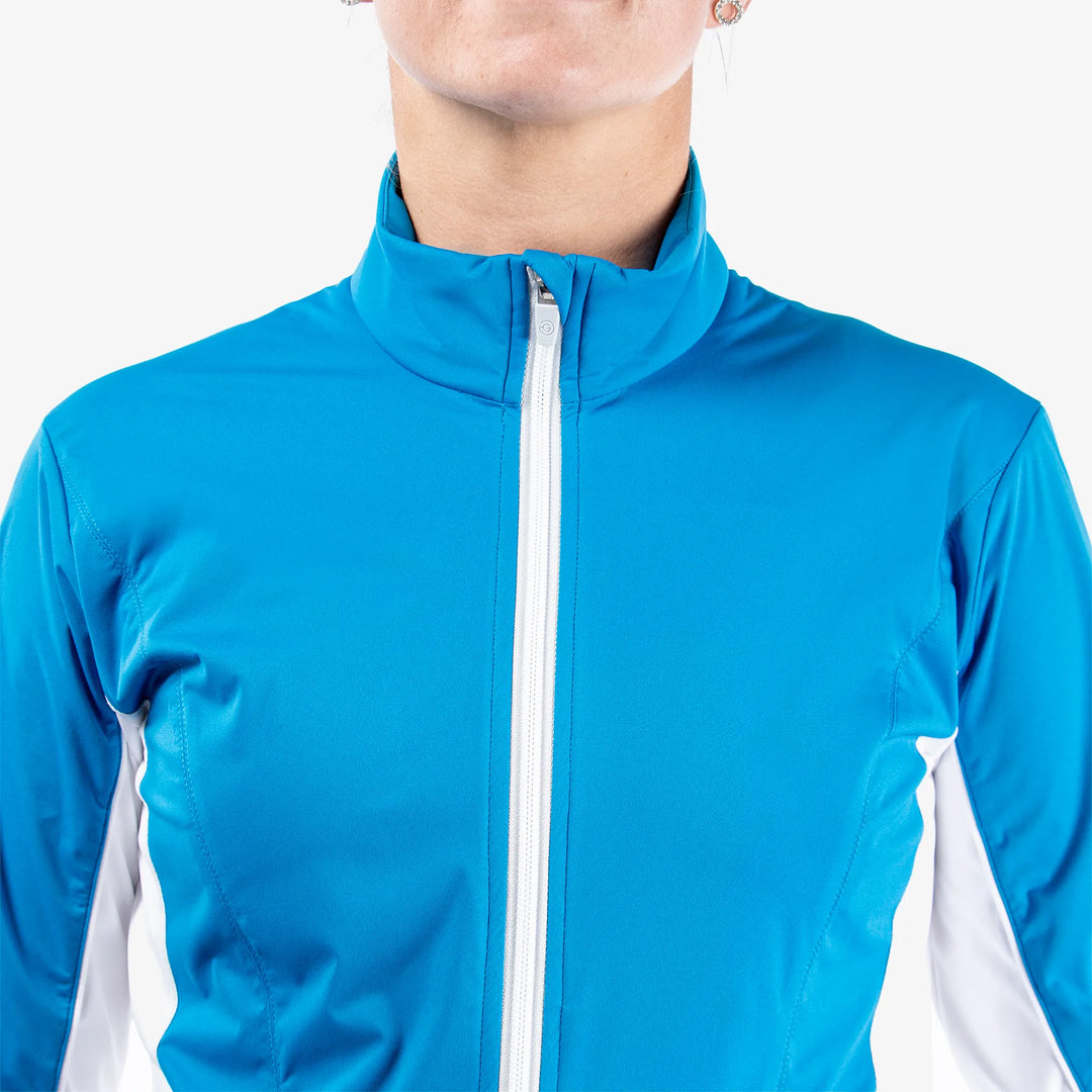Larissa is a Windproof and water repellent golf jacket for Women in the color Blue/White(3)