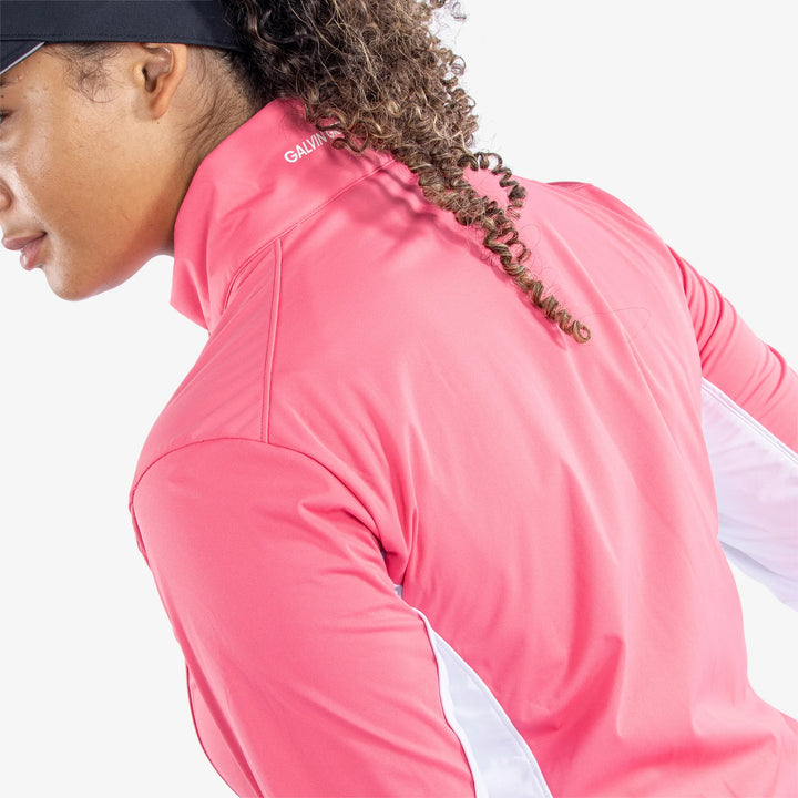 Larissa is a Windproof and water repellent golf jacket for Women in the color Camelia Rose/White(6)