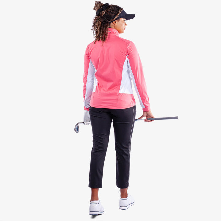 Larissa is a Windproof and water repellent golf jacket for Women in the color Camelia Rose/White(7)
