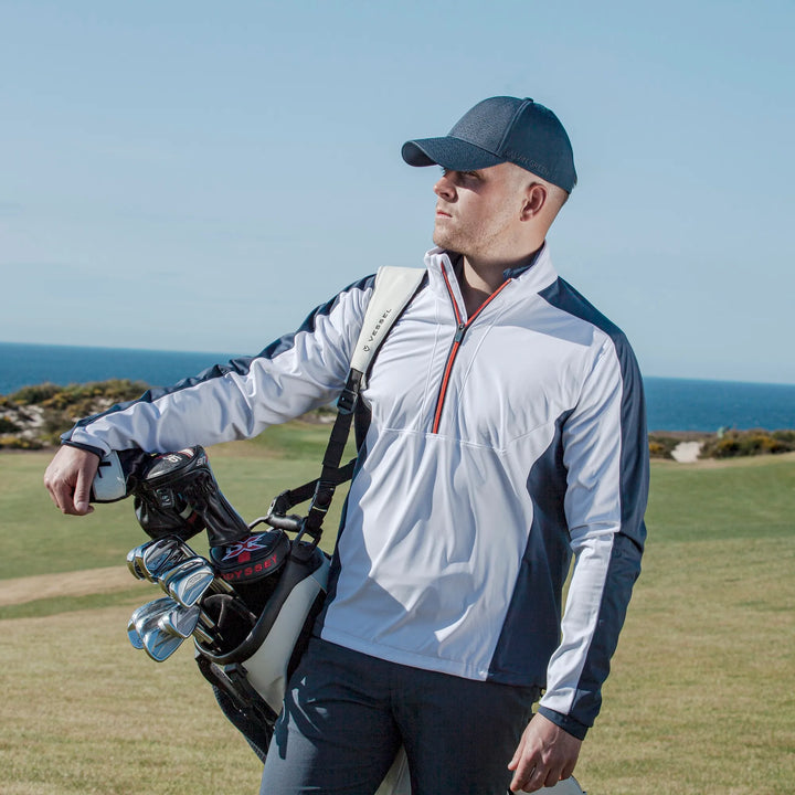 Lawrence is a Windproof and water repellent golf jacket for Men in the color White/Navy/Orange(5)