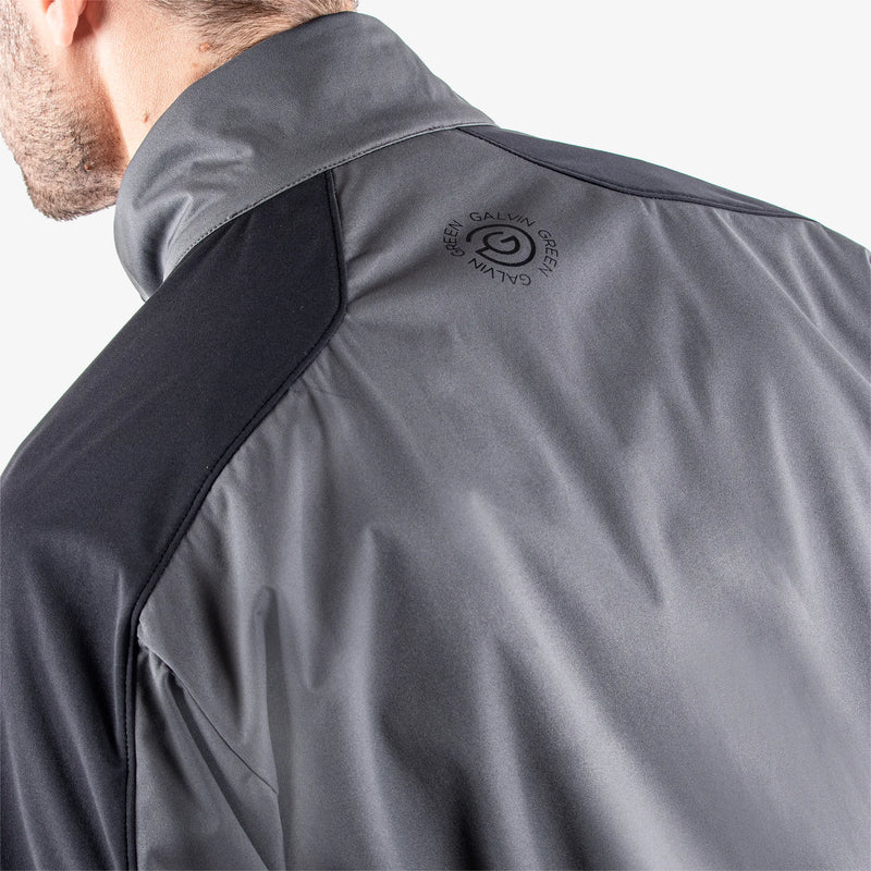 Lawrence is a Windproof and water repellent golf jacket for Men in the color Forged Iron/Black/Red(7)